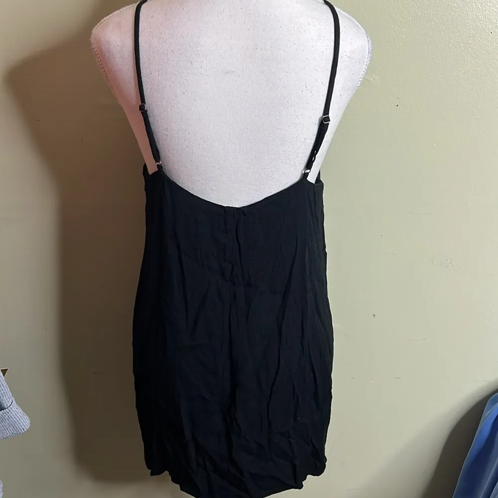 Reformation Camille Rowe The Laurien Black Mini popover dress, size medium - Image 5