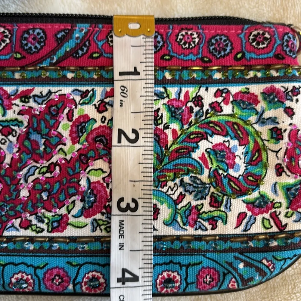 PINK AND BLUE FLORAL DESIGN WRISTLET WITH SOME BEADS ON ONE SIDE AND BLACK STRAP - Image 5