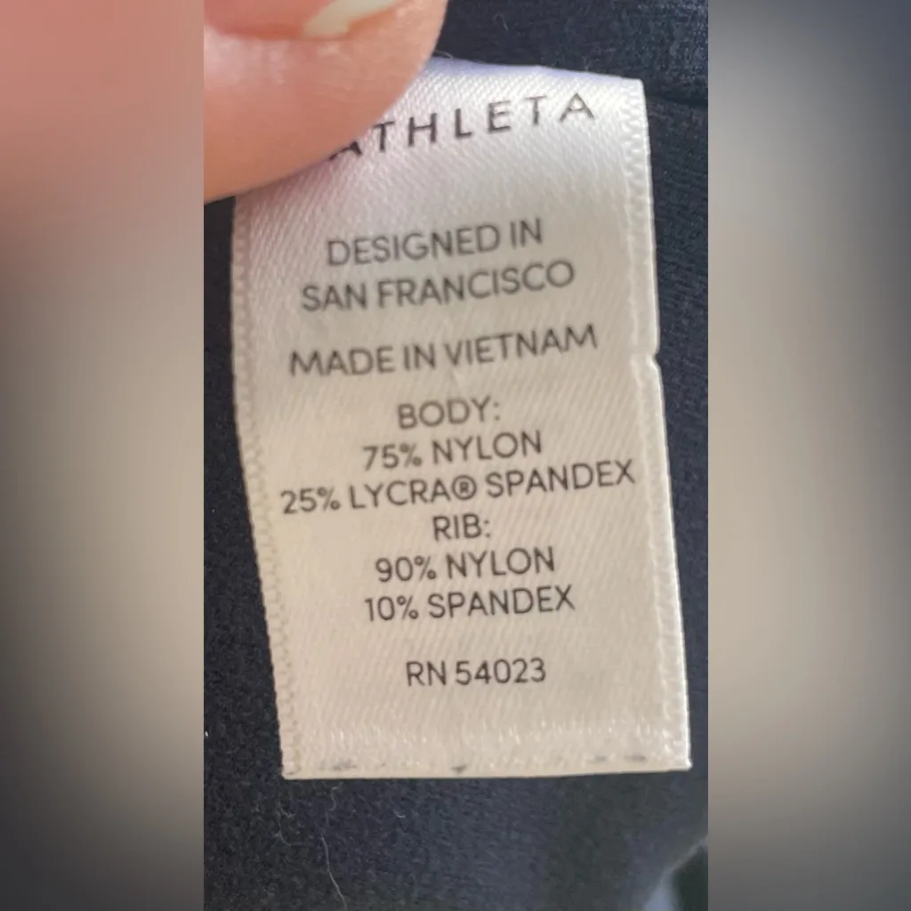 Athleta nylon / spandex navy blue flare leggings, ankle slit, elastic sides; S - Image 6