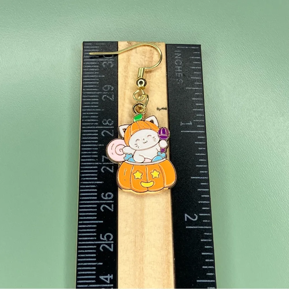 Cute Halloween Cat in a Pumpkin Full of Candy Earrings Orange - Image 3