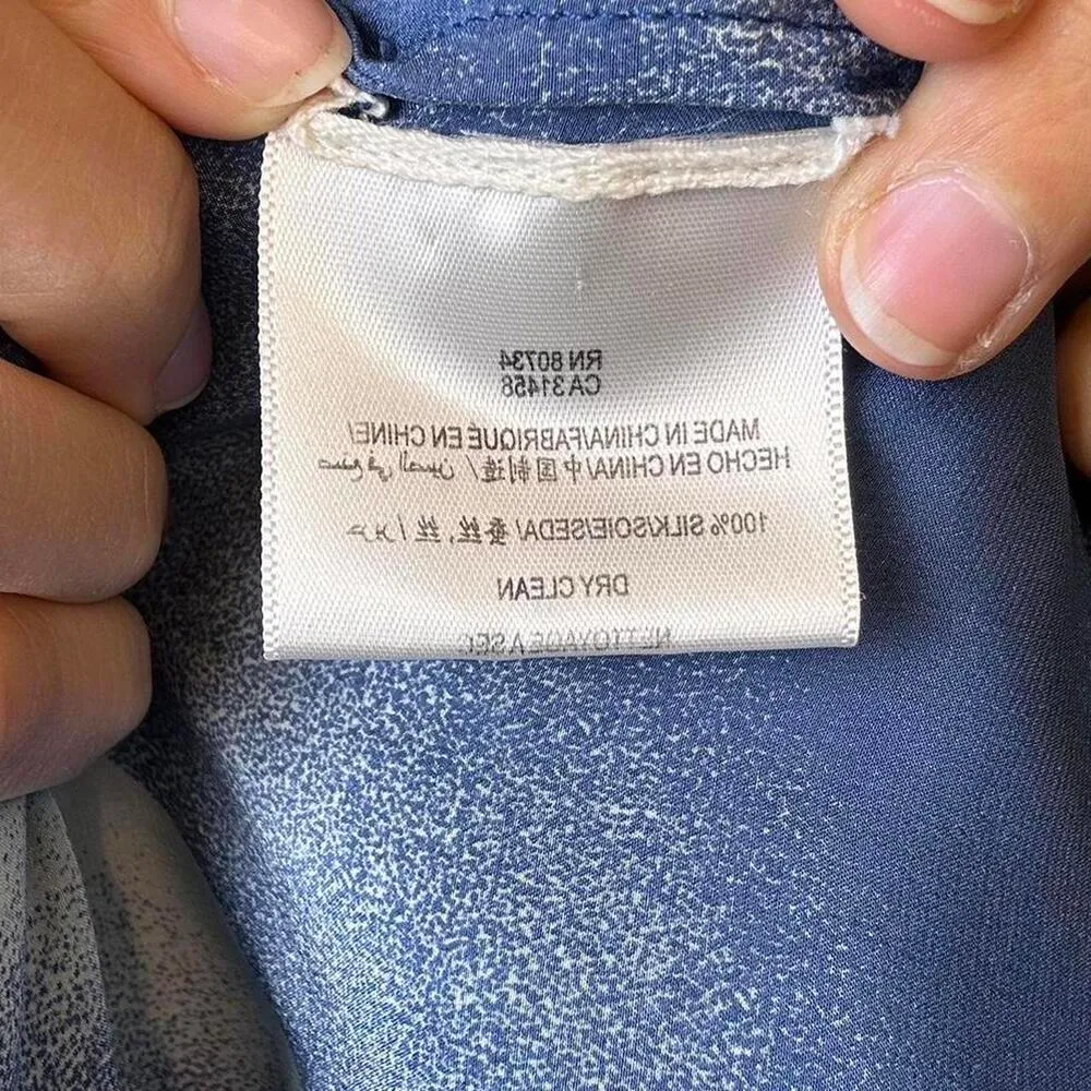 Blue and white silk one-shoulder wrap top with a floral design - Image 6