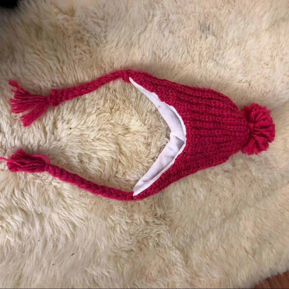 Knitted women's hat on a soft lining with ties. - Image 3