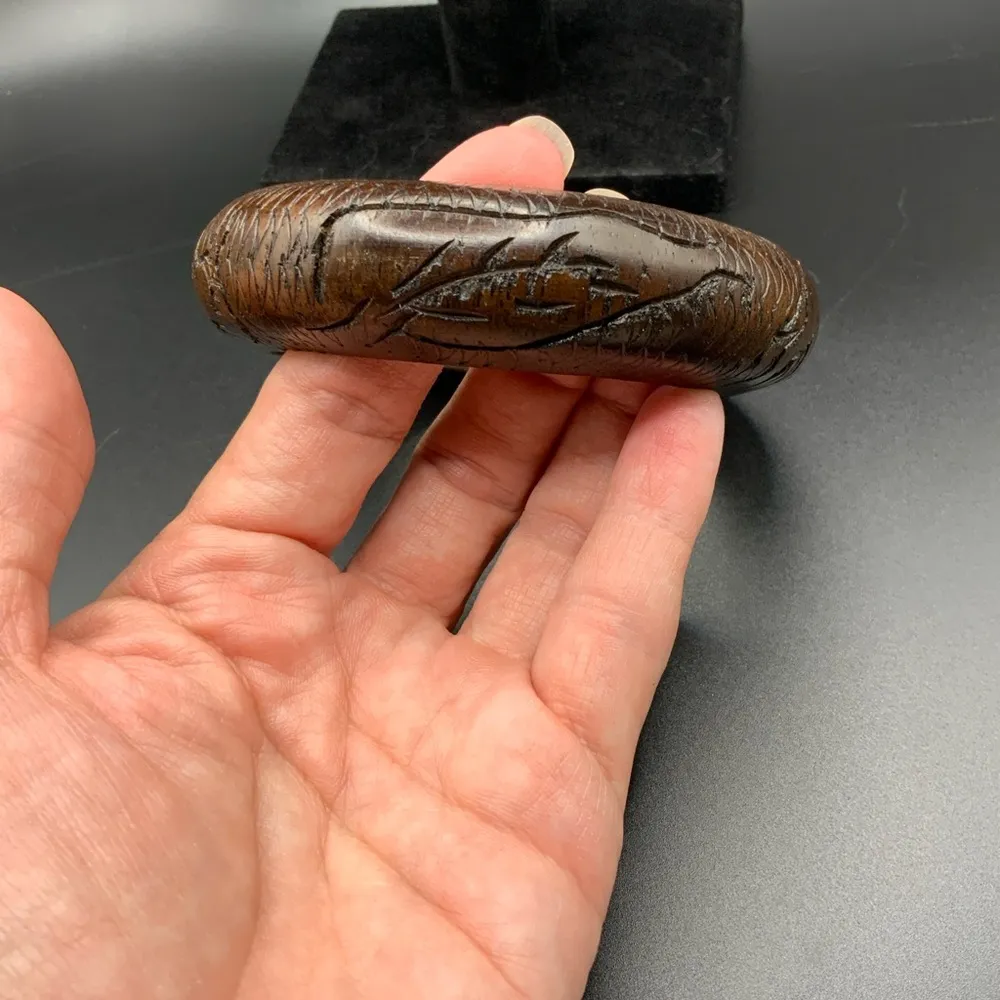 Wood carved bangle with images of rhinoceros and hippopotamus Brown - Image 7