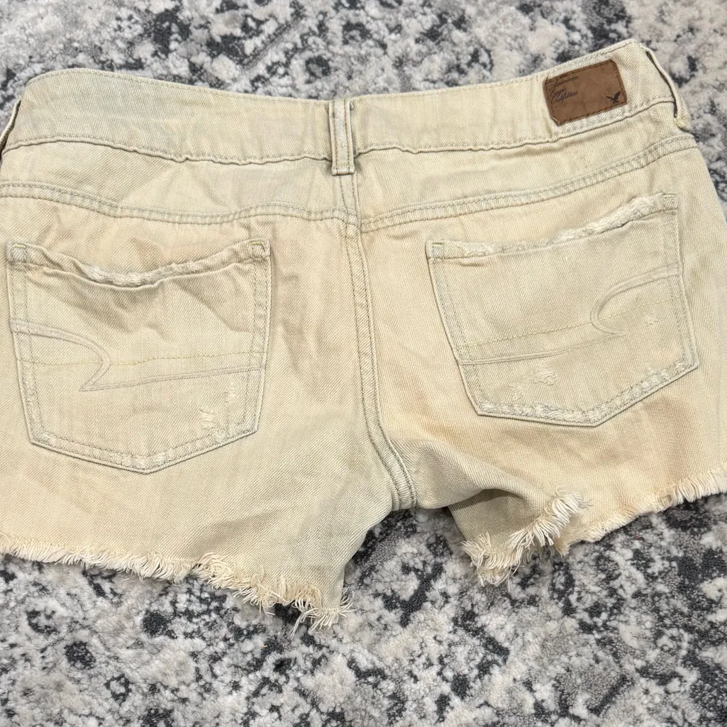 American Eagle Outfitters VINTAGE (2012) Washed Distressed Denim Tan Cut-offs - Image 2