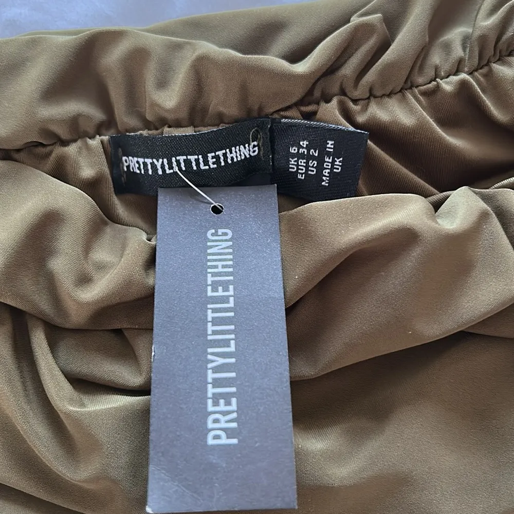 Gorgeous Brand New with Tags Prettylittlething Olive Off the Shoulder Slinky Top - Image 2