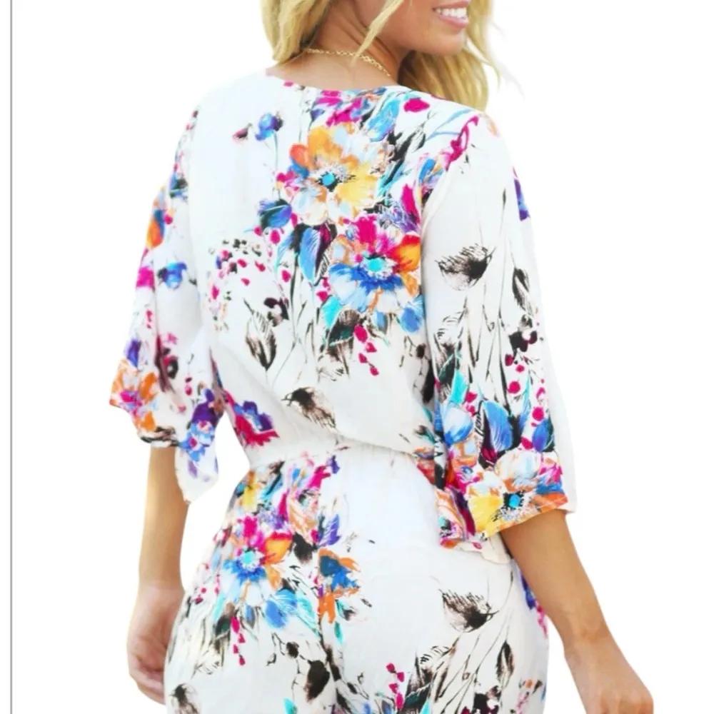Umgee Floral Print Romper with pockets. NWT - Image 2