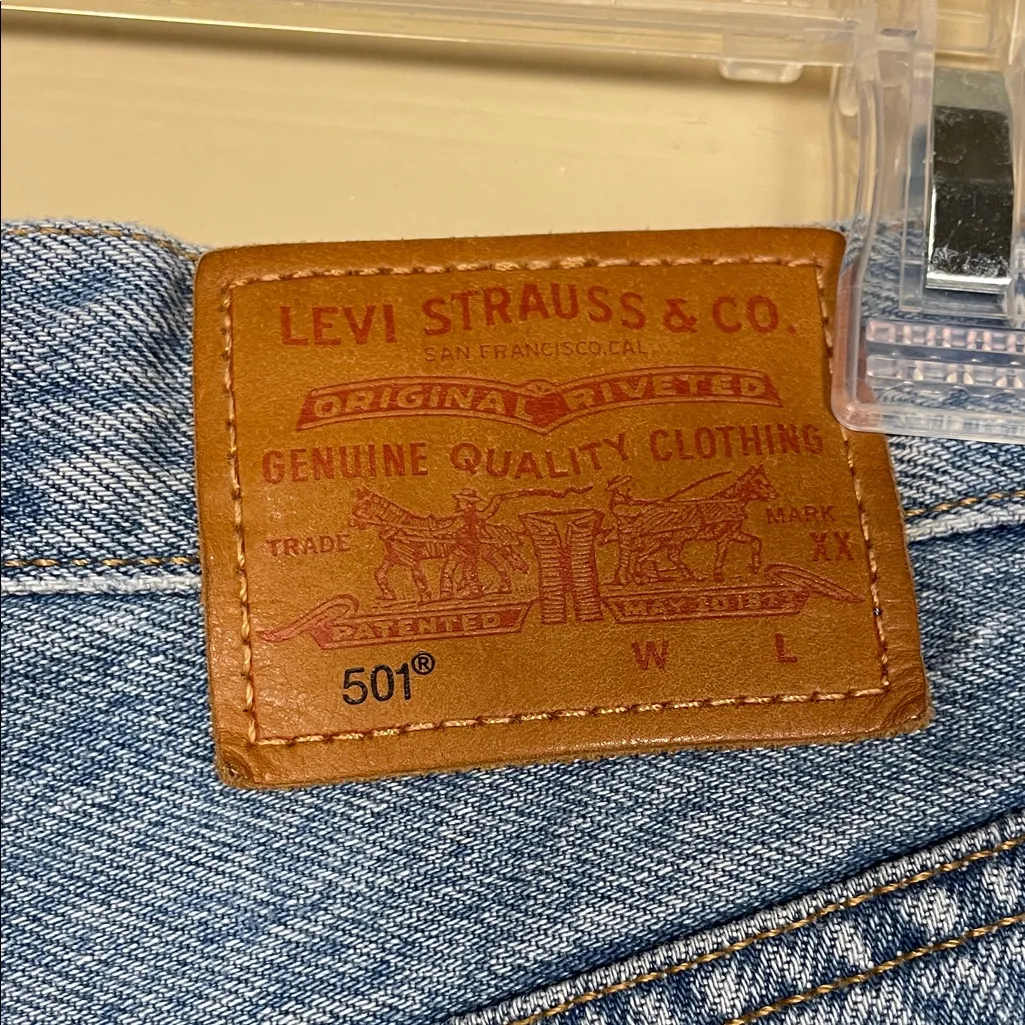 Levi’s Premium Women’s 501 Distressed Raw Hem Light Wash Button-Fly Denim Shorts - Image 7