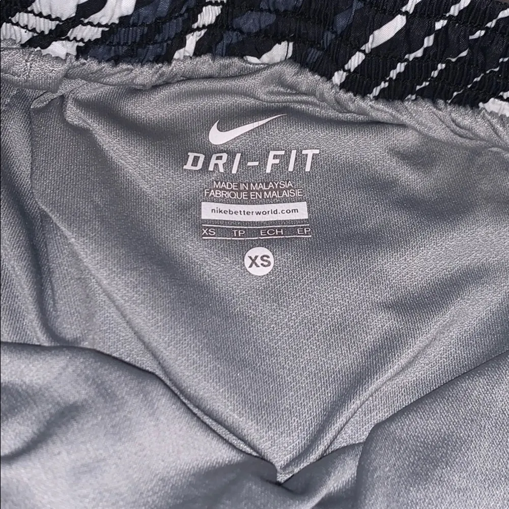 Grey and white striped nike dri fit shorts - Image 3
