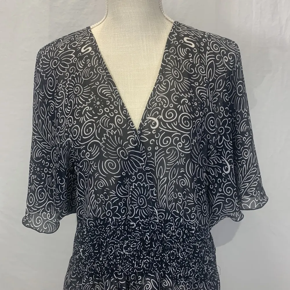 Sheer Black Floral Print V-Neck Peplum Top Size Large - Image 2