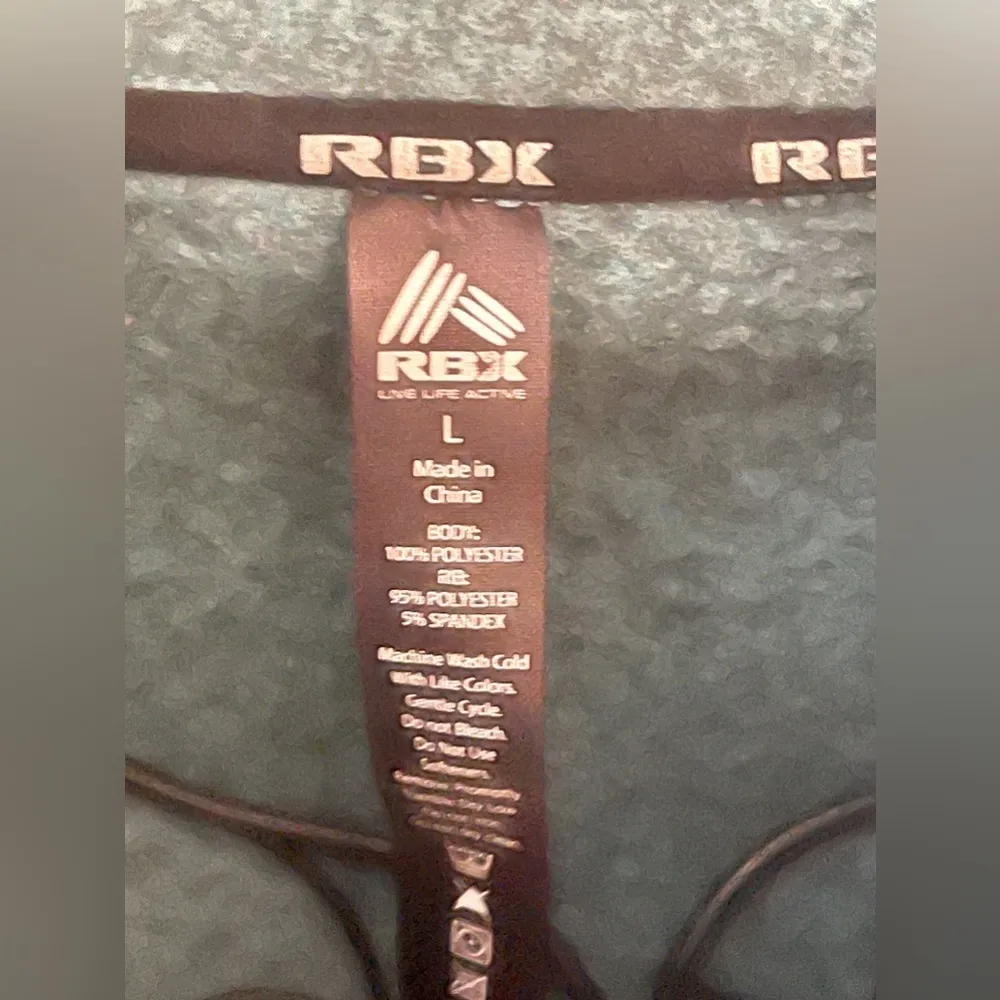 RBX Running Jacket with Thumb Holes and Multiple Pockets. Size Large​​ - Image 2