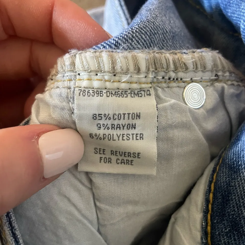 Blue Denim Jean Shorts with White and Yellow Embroidered Flowers, Size 0/24 - Image 14