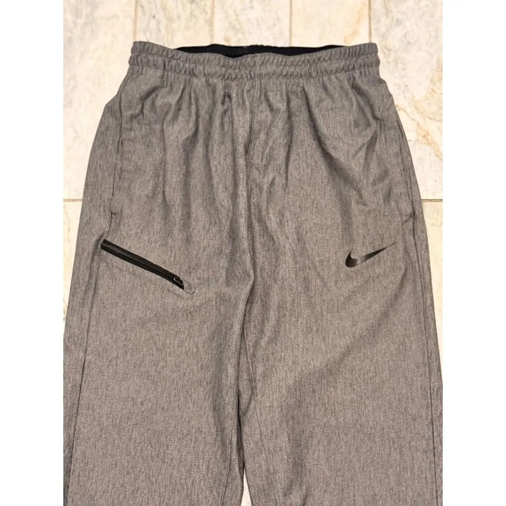 Nike women's medium gray DRI-FIT tapered leg sweatpants MSRP $79.99 - Image 3