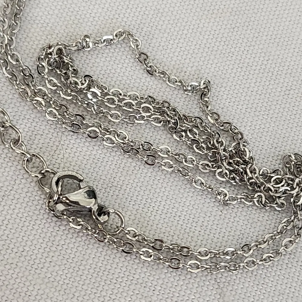 Silver Stainless Steel and Black Quatrefoil Flower Clover Necklace Earring Set - Image 5