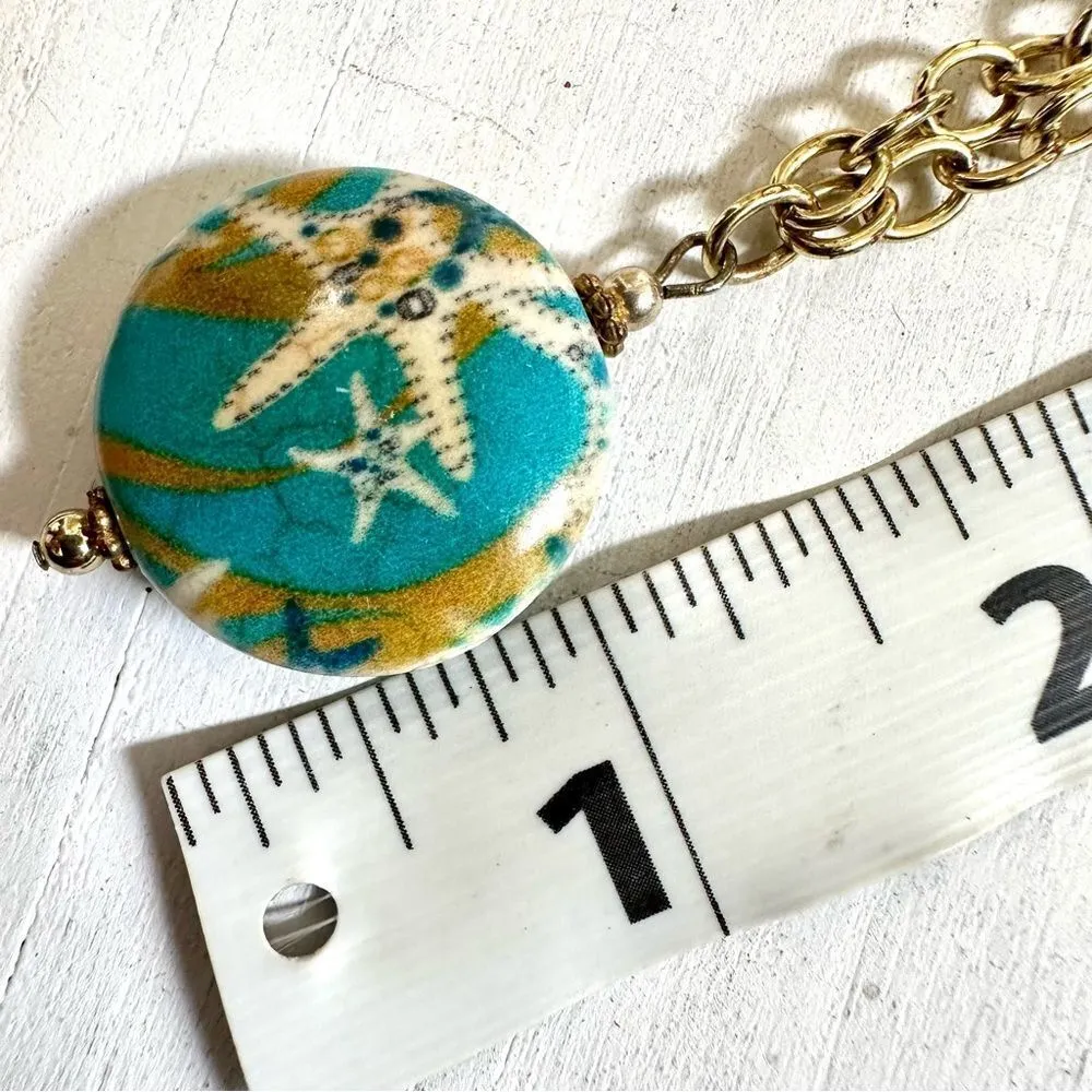 Gold tone blue starfish necklace and earrings set - Image 7