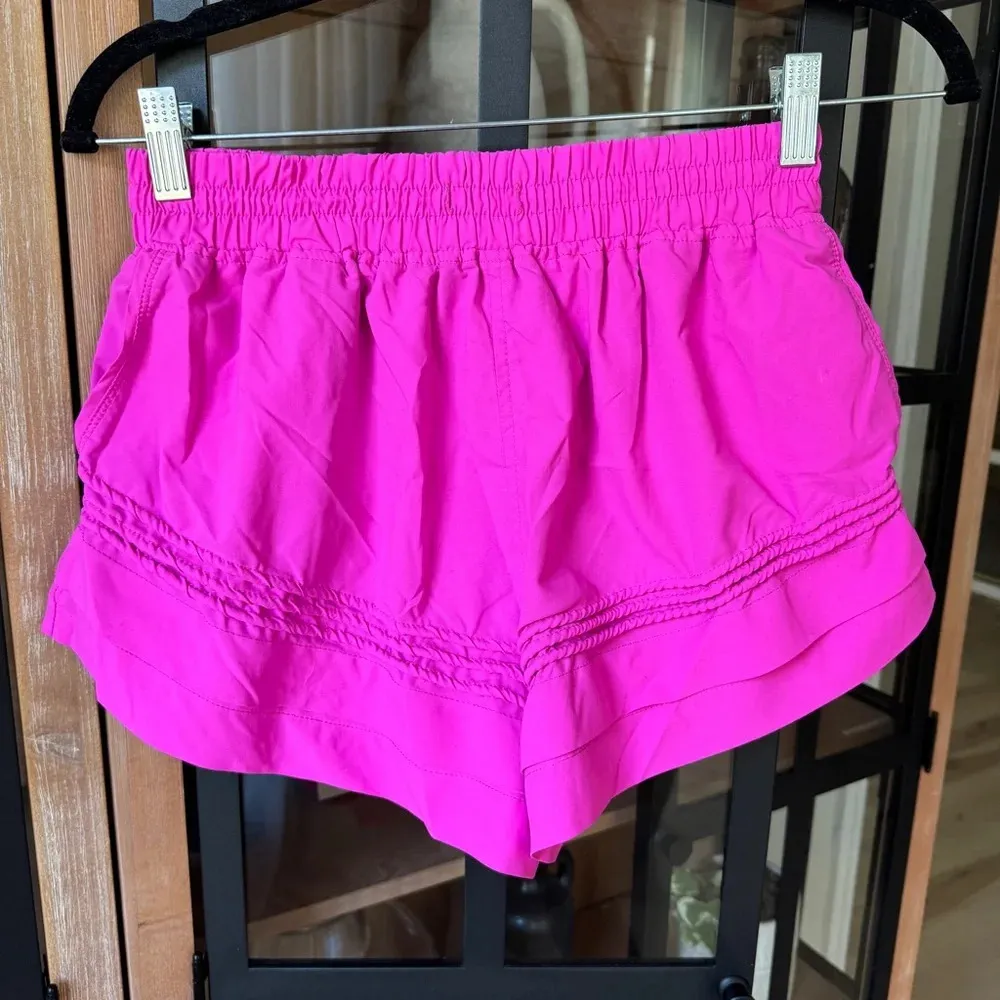 FP Movement Check It Out shorts neon barbie pink workout running pockets - Image 10