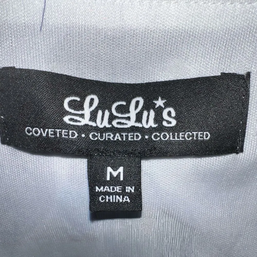 Lulu’s new with tags cute frilly blue zebra print wrap around dress! White Size M - Image 5