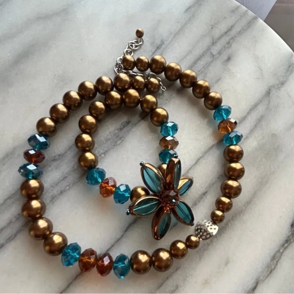 Handcrafted beaded gold and blue necklace and bracelet - Image 11