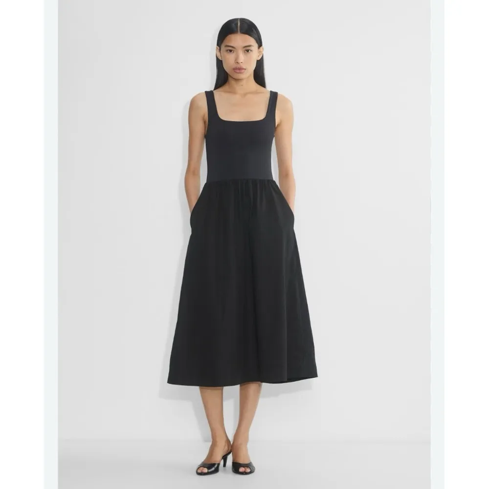 aritzia babaton black dress Aritzia Babaton slit slip dress. Worn only once!