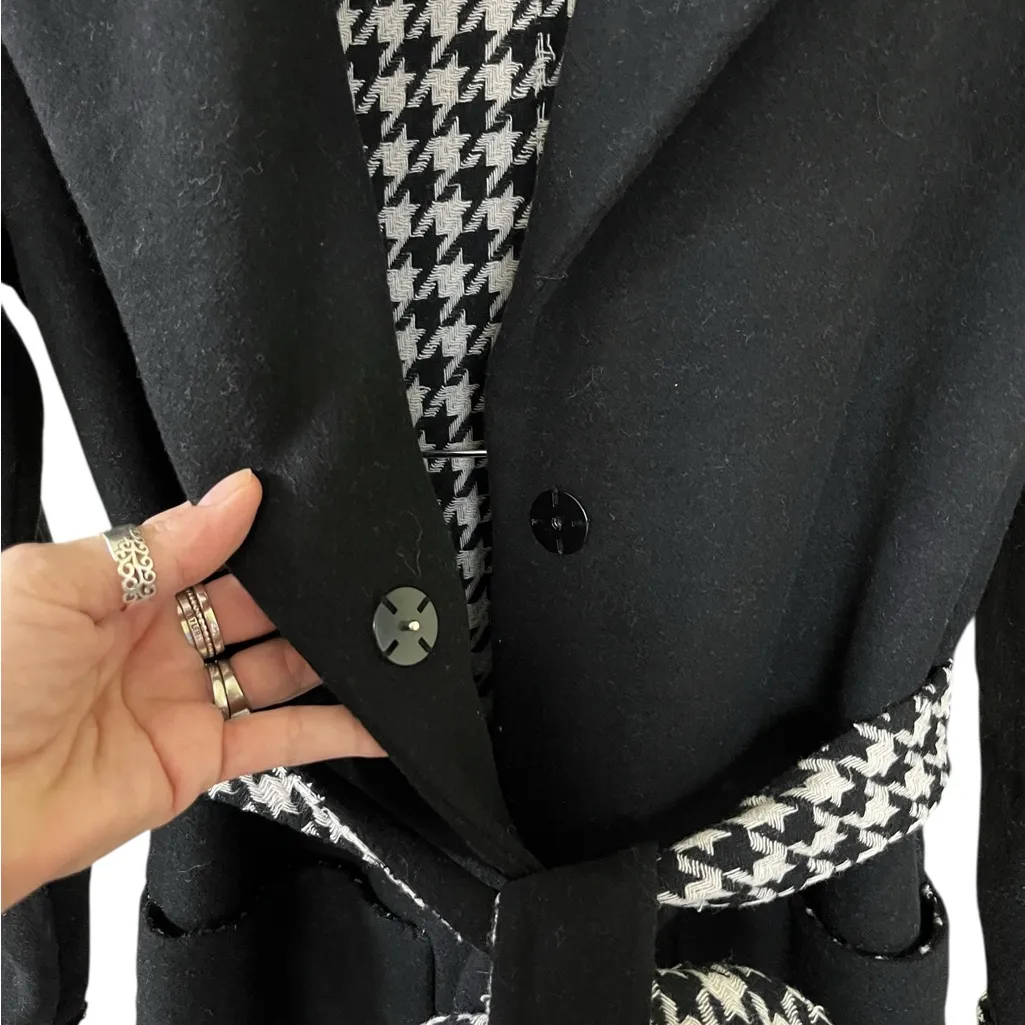Dawn Levy  Celine long black wool coat with houndstooth lining. - Image 8