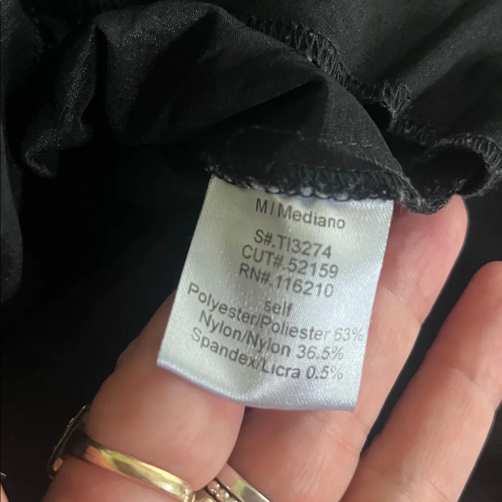 ENTRY  black ruffled vest with a front zipper closure - Image 8