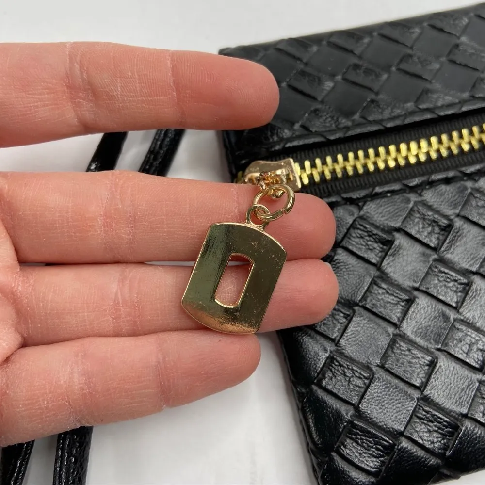 Black Faux Leather Woven Gold Tone Exposed Zipper Wristlet - Image 2