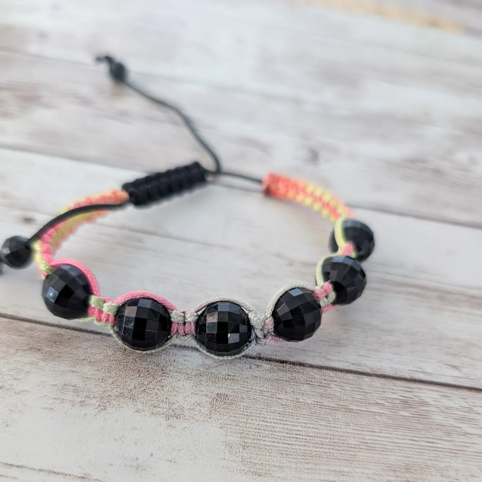 Multi Colored Cord Bracelet with Black Wrapped Beads - Image 4