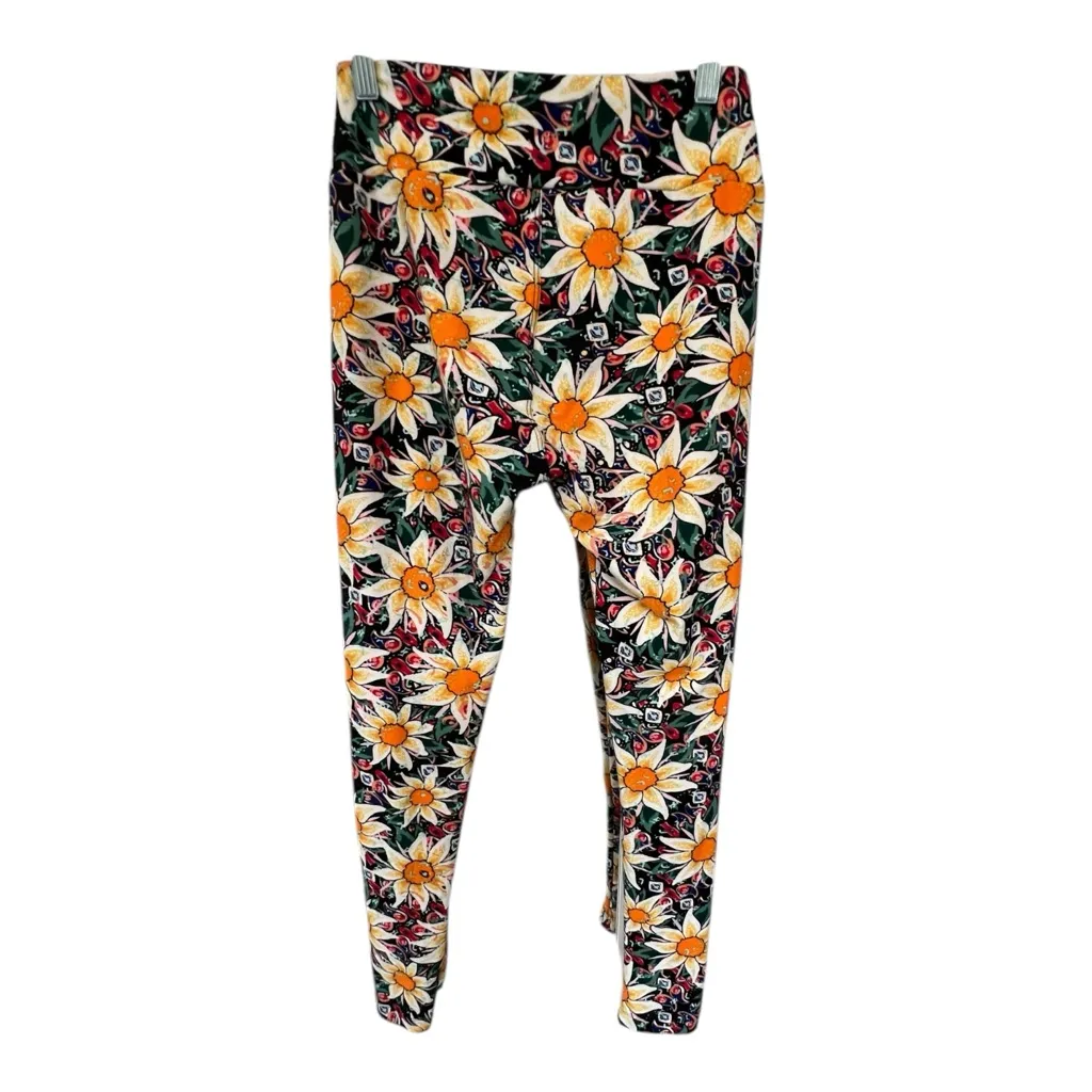 LuLaRoe  Leggings with Yellow sunflowers ontop of a green and red design. - Image 2