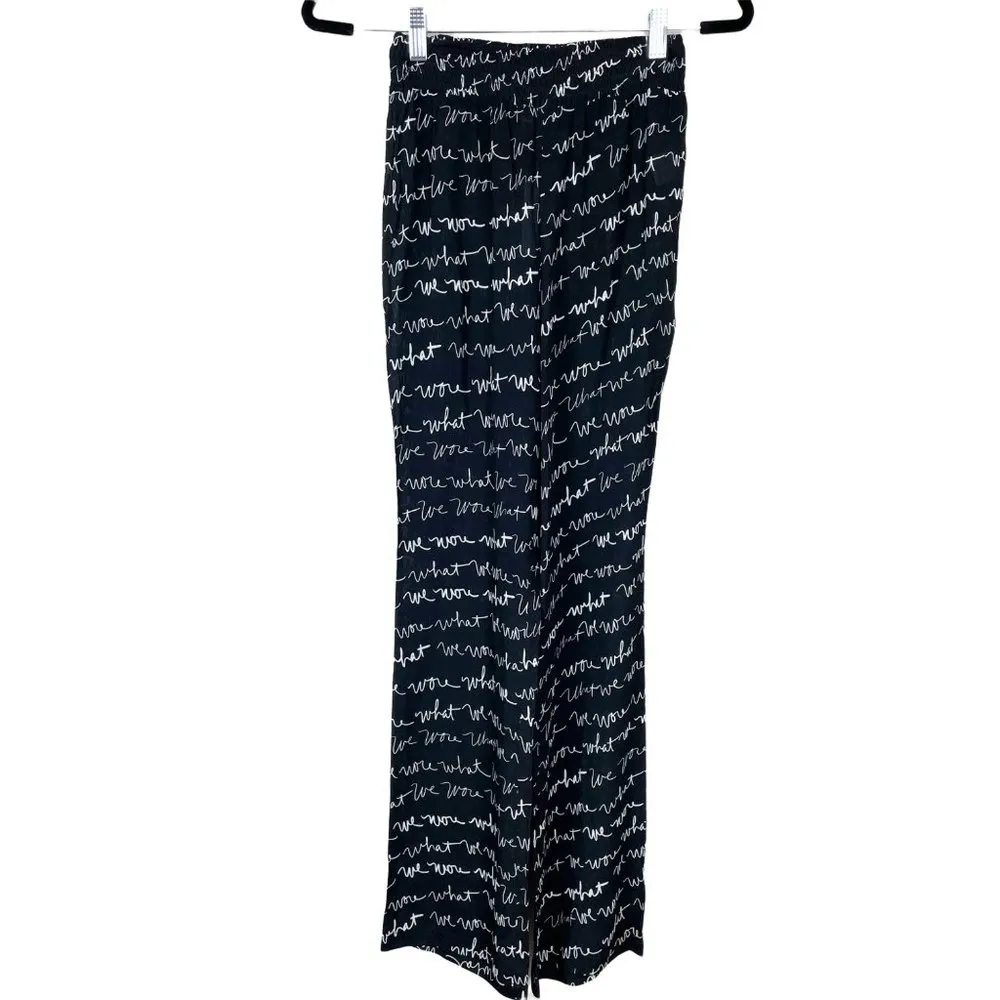 NWT‎ We Wore What Woman's Sz XS Black Sheer Flared Leg Logo Print Smocked Pants - Image 2