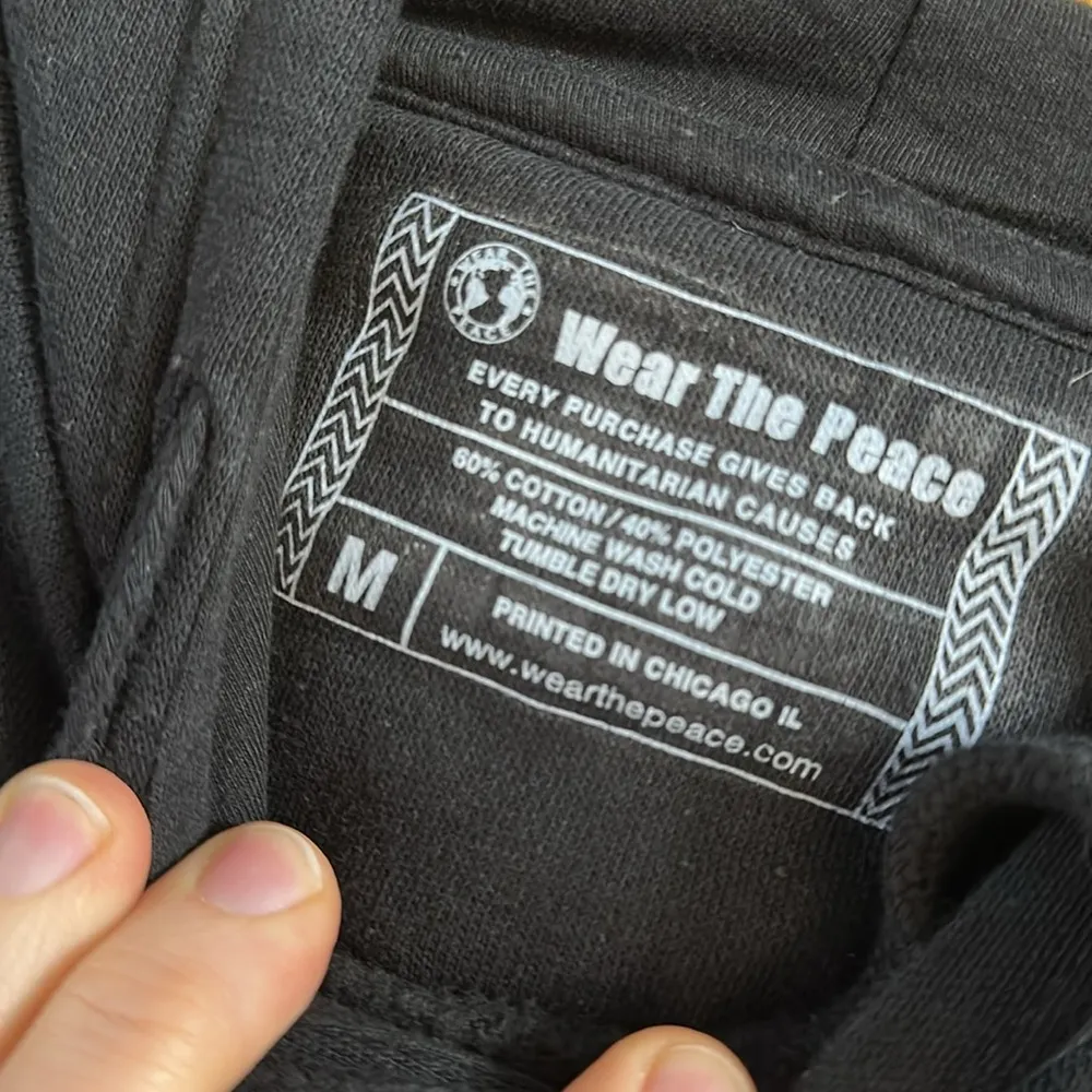 Wear the Peace “She’s Someone” Black Graphic Hoodie, Medium (Unisex) - Image 4