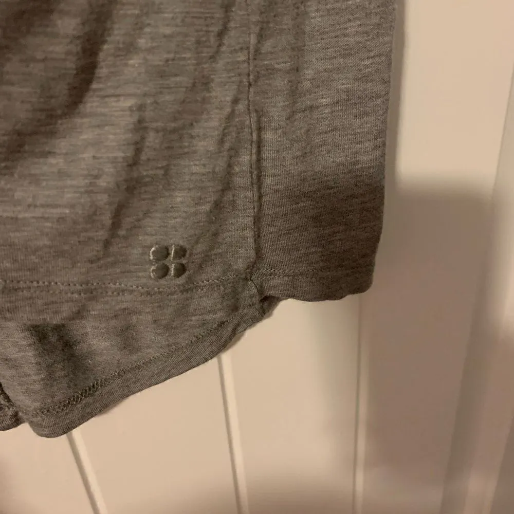 Sweaty Betty ladies athletic shirt.  Size: XS.  Hi Lo hem. - Image 2