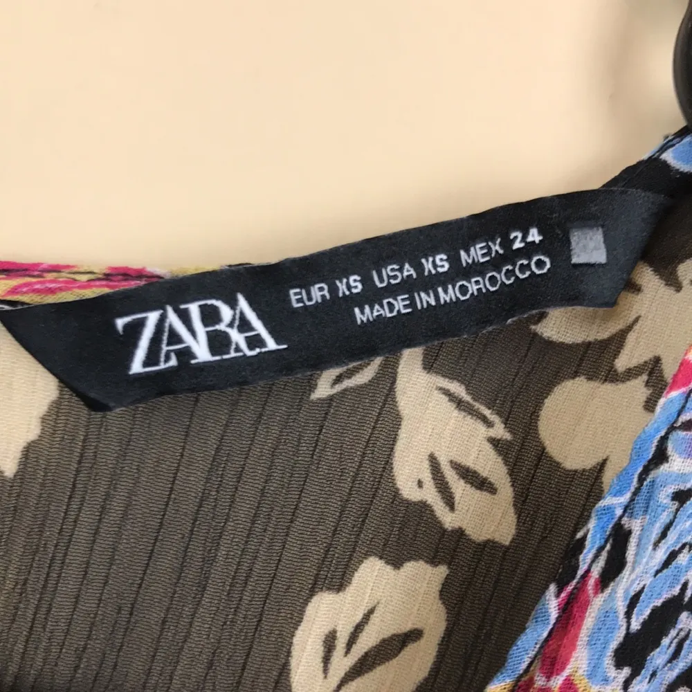 Zara Women’s Floral Boho Multi-Colored Half Sleeve Sheet Button-Up Front Romper - Image 12