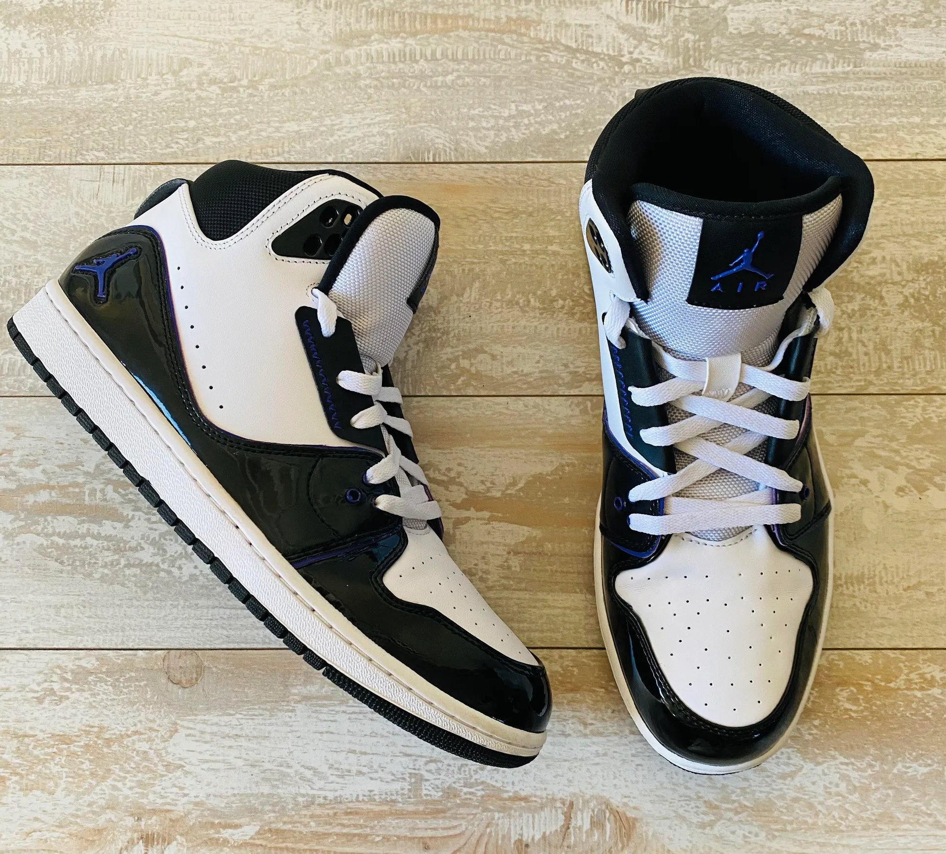 Air Jordan Black and Purple High Top Sneakers - Image 4