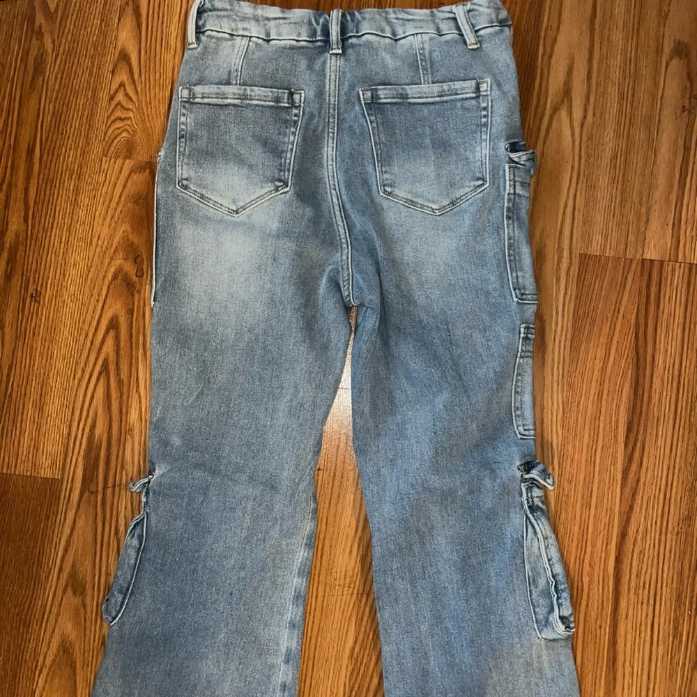 Insane Gene size 9 stretchy jeans. 5 front cargo pockets. Flares. 31 inch inseam - Image 5