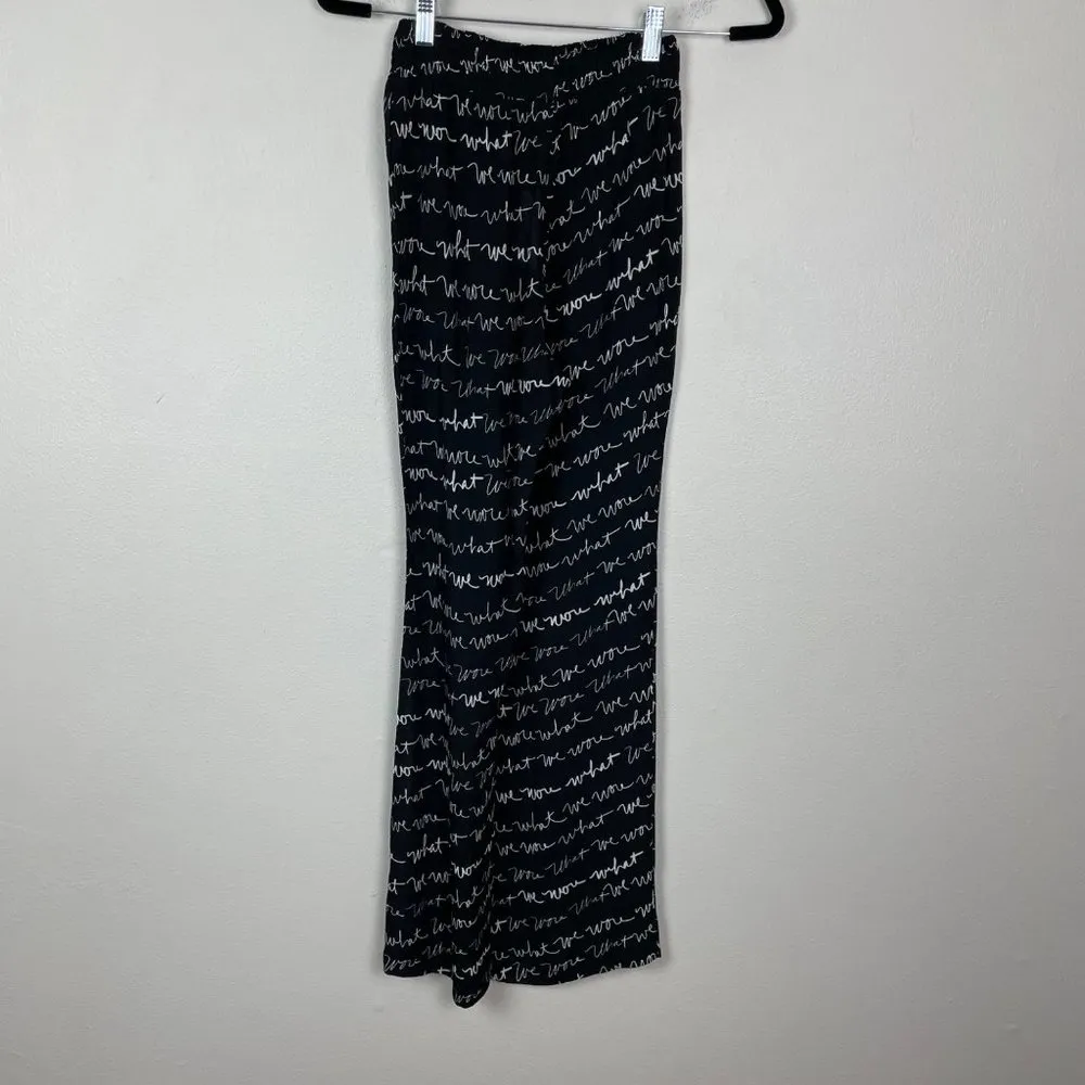 NWT‎ We Wore What Woman's Sz XS Black Sheer Flared Leg Logo Print Smocked Pants - Image 7