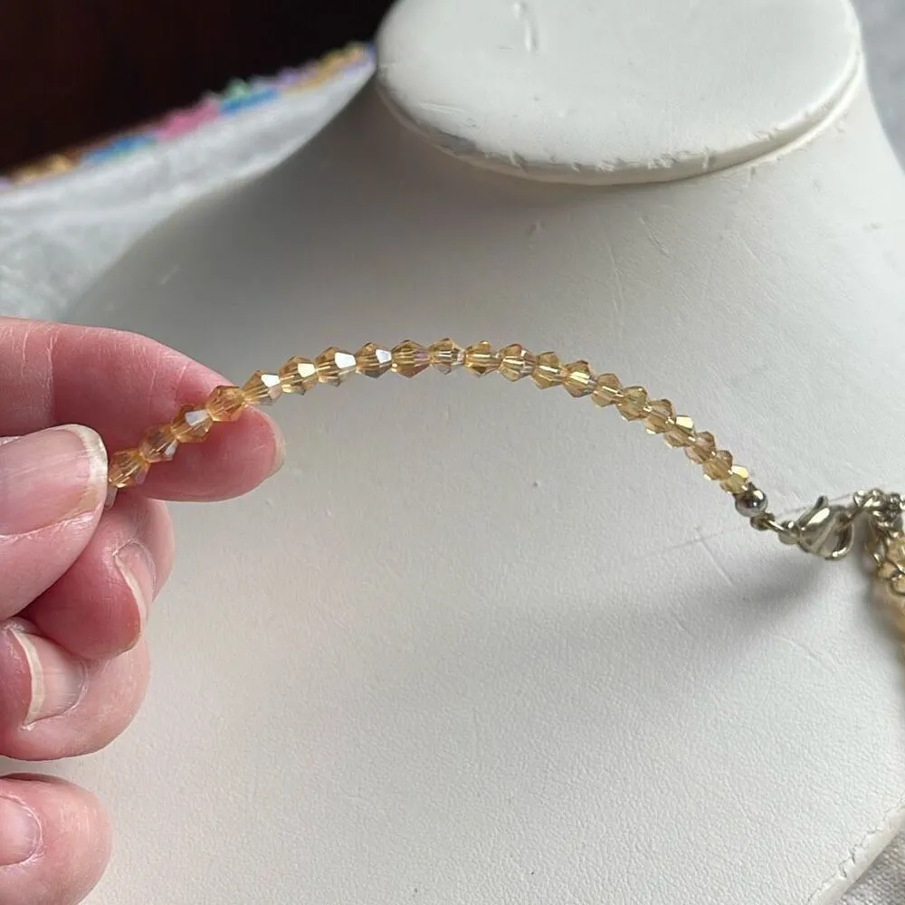 Peach glass AB coated bi-cone round facetted necklace. - Image 5