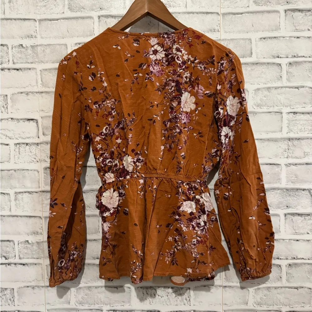 Women’s Maurices burnt orange floral deep v-neck wrap long sleeve top XS - Image 2