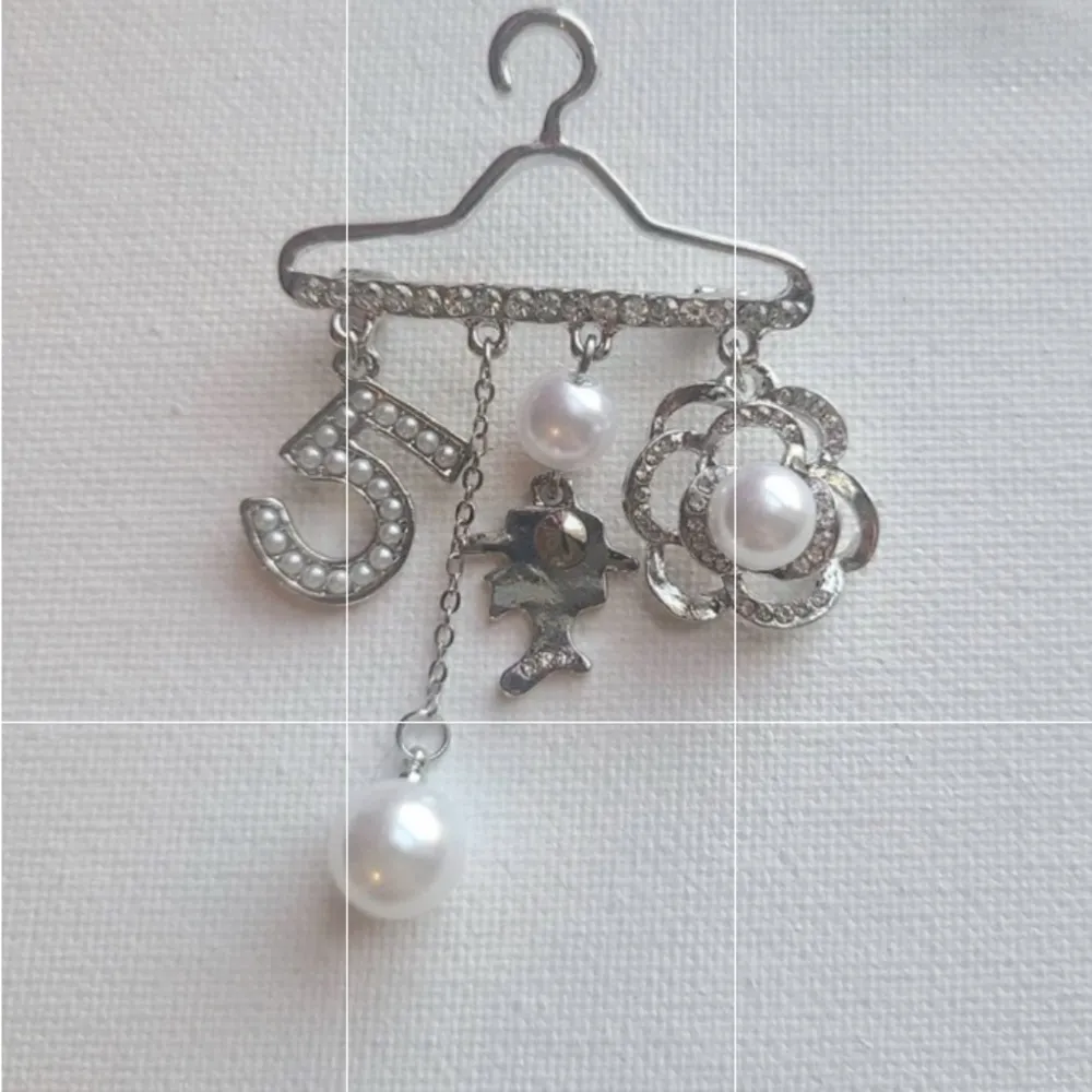 Whimsical Silver and White Charm Brooch - Image 2