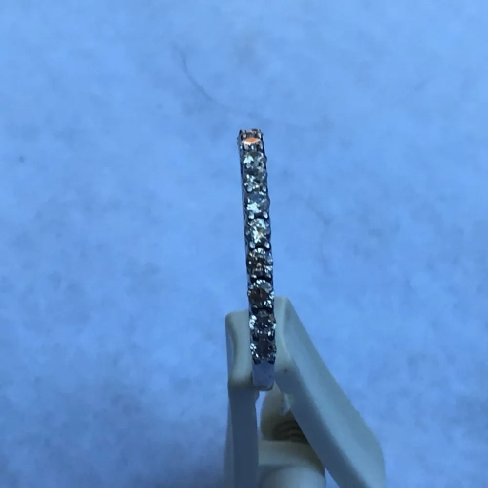 Sterling Silver Ring With Row of 12 Cubic Zirconia Accents, Size 7 - Image 5