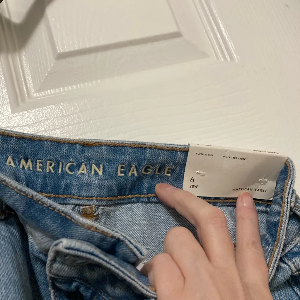 American Eagle New Super High Rise Light Wash Distressed Denim Mini Skirt - Image 2