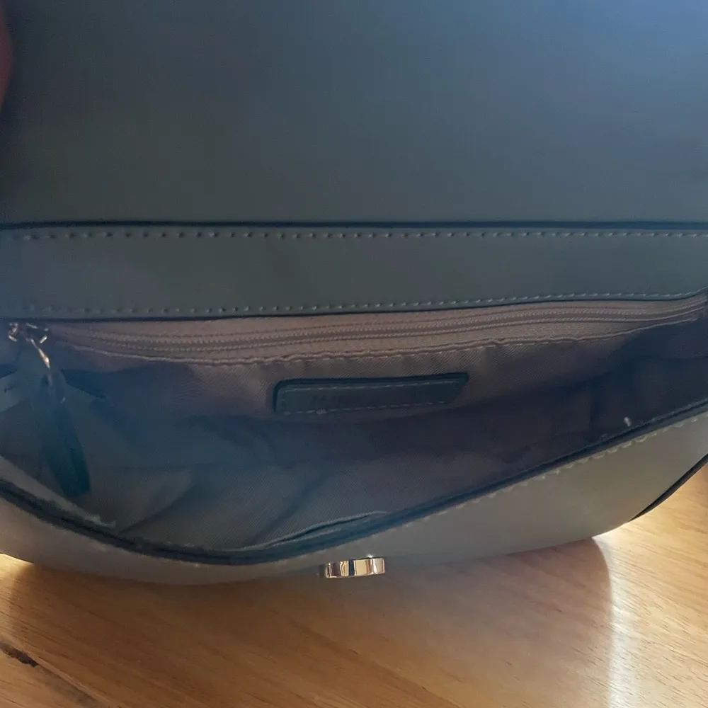 Nine West
Kyelle Flap Embossed Mini Crossbody Bag - Image 4