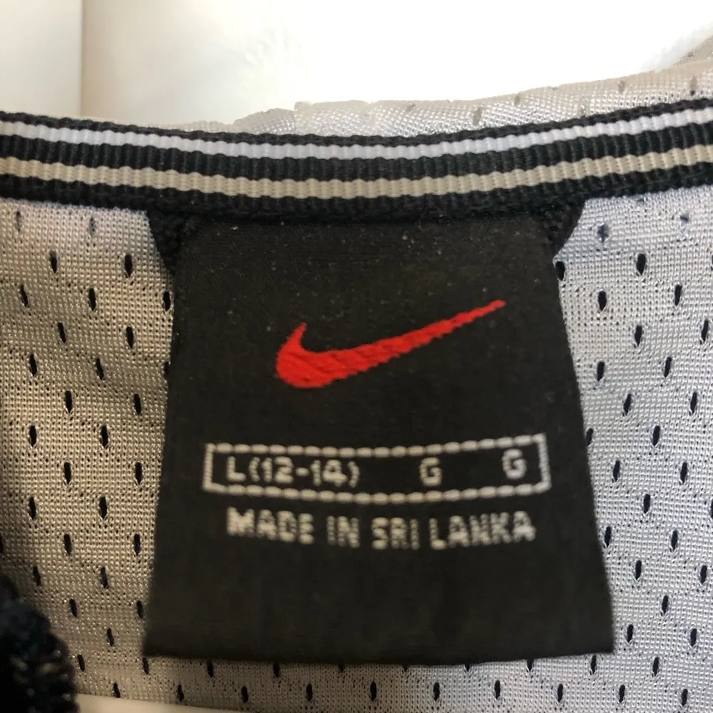 Vintage Nike woman’s size large 12-14 navy and white lined 1/4 zip windbreaker - Image 7