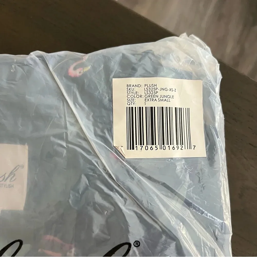 Revolve Plush Silky Jungle Print PJ Set in Emerald Print - Image 4