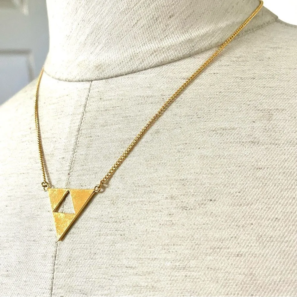 Trina Turk gold tone cut out triangle pendant necklace - Image 3