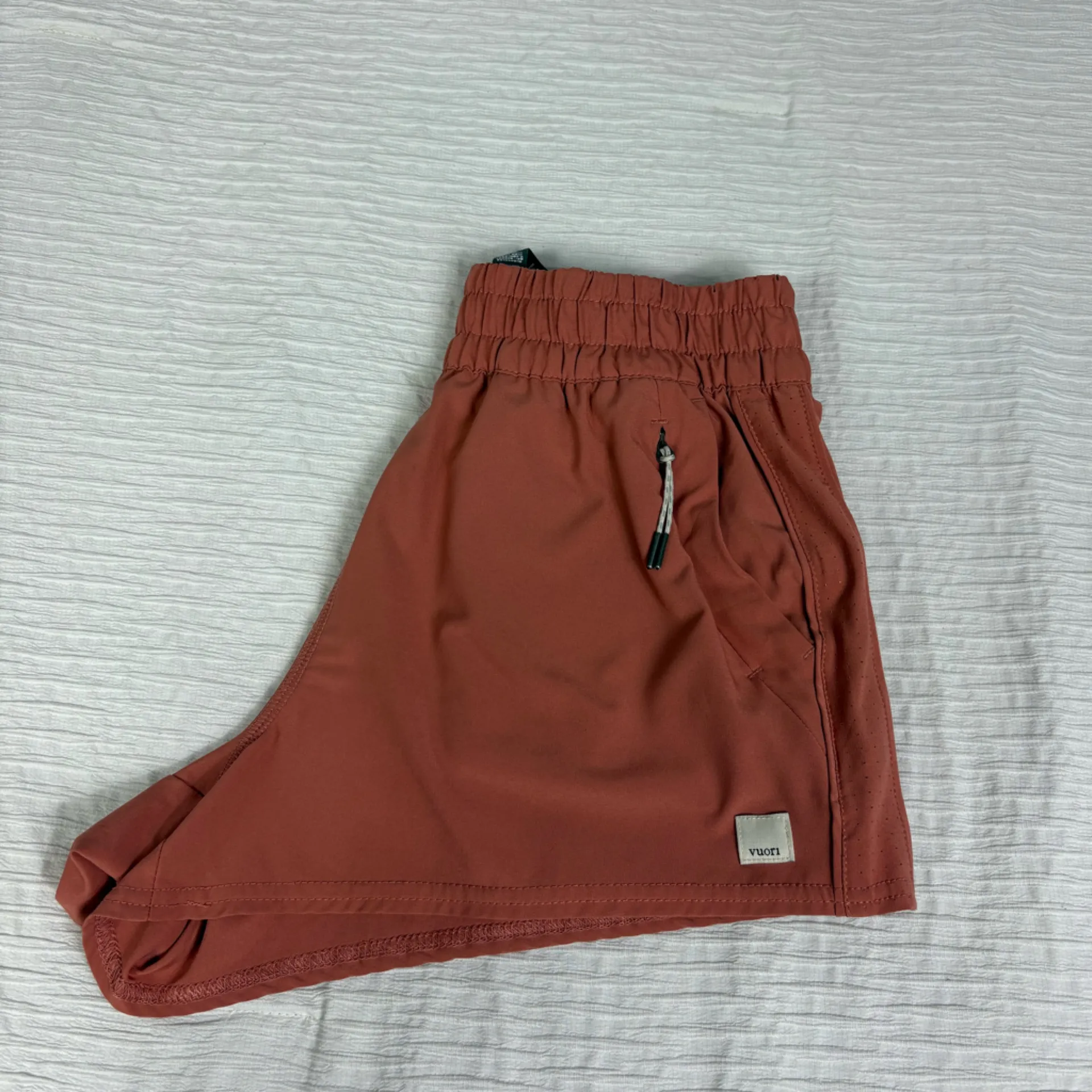 Vuori Women's Athletic Shorts in Rust - Image 5