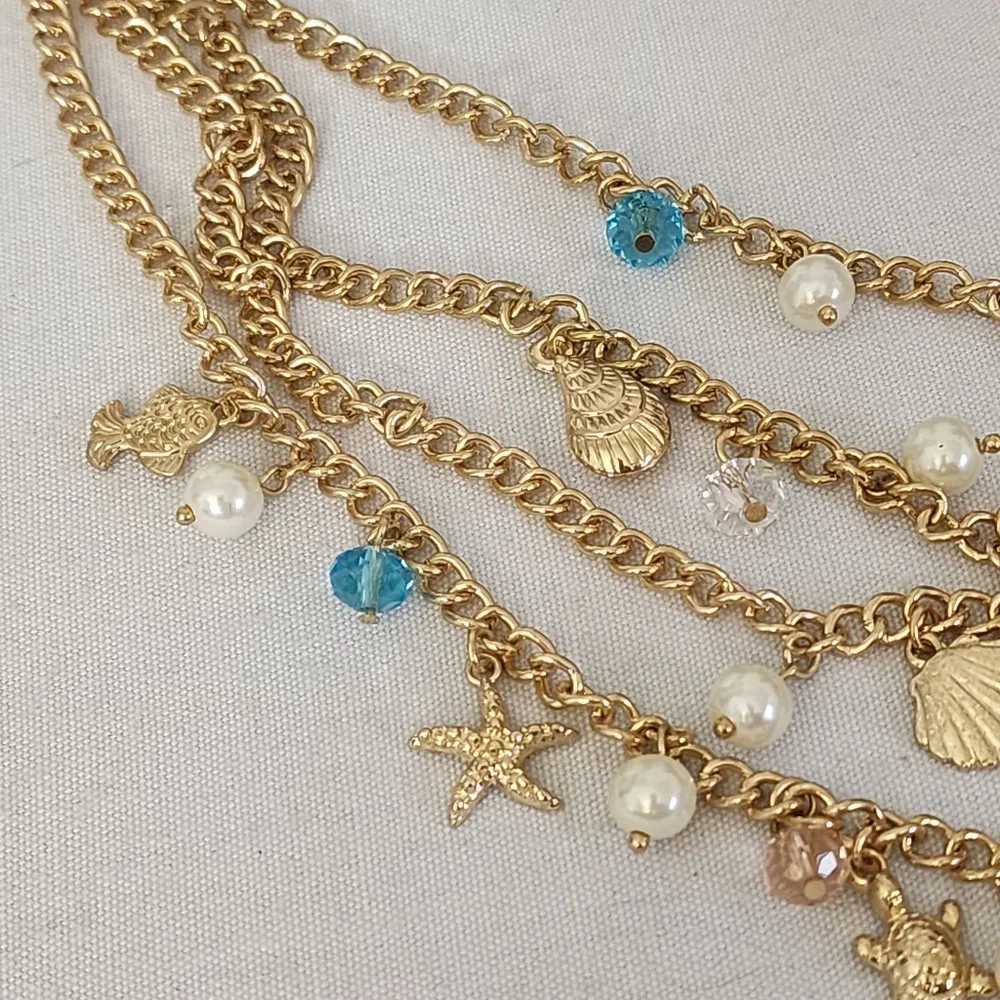 Gold 4 Strand Chain Necklace with Nautical Charms and Starfish Earrings Set - Image 3