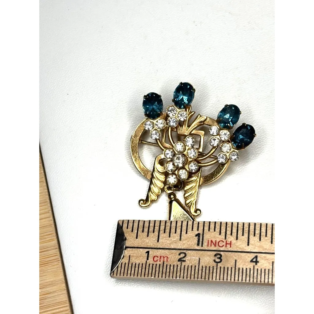 Vintage Gold Tone Rhinestone Brooch With Blue & Clear Stones - Image 3