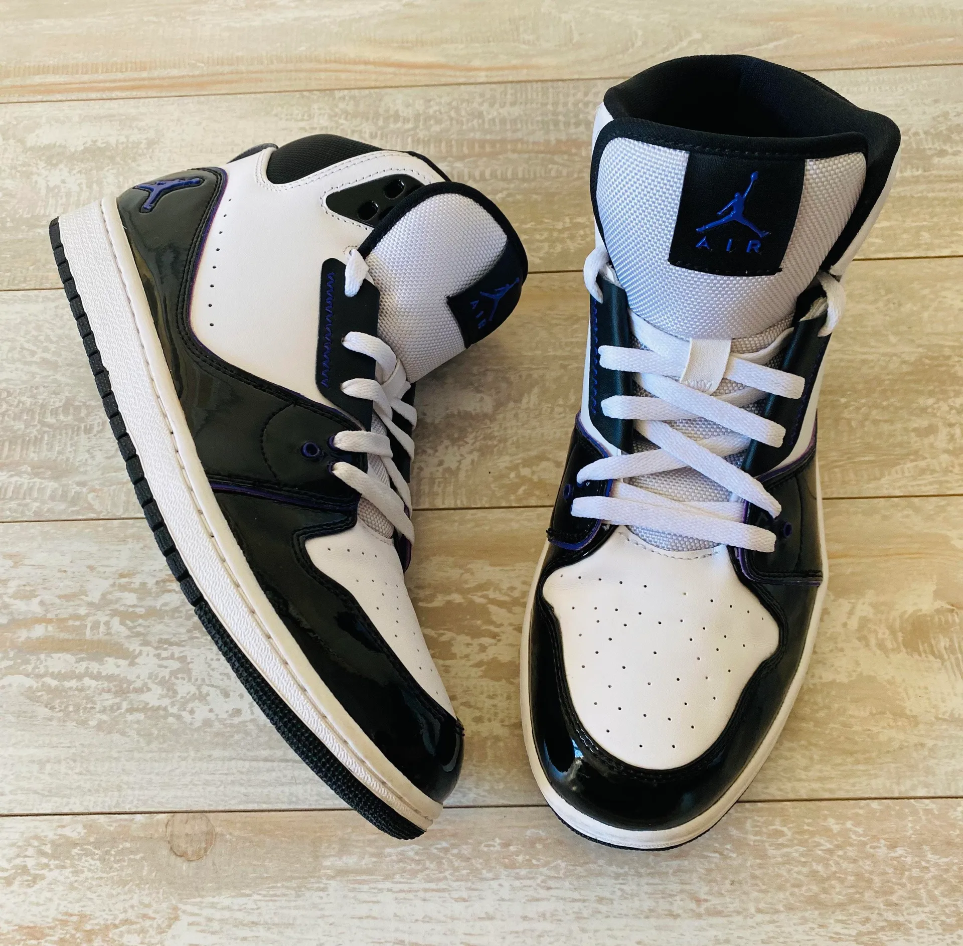 Air Jordan Black and Purple High Top Sneakers - Image 2