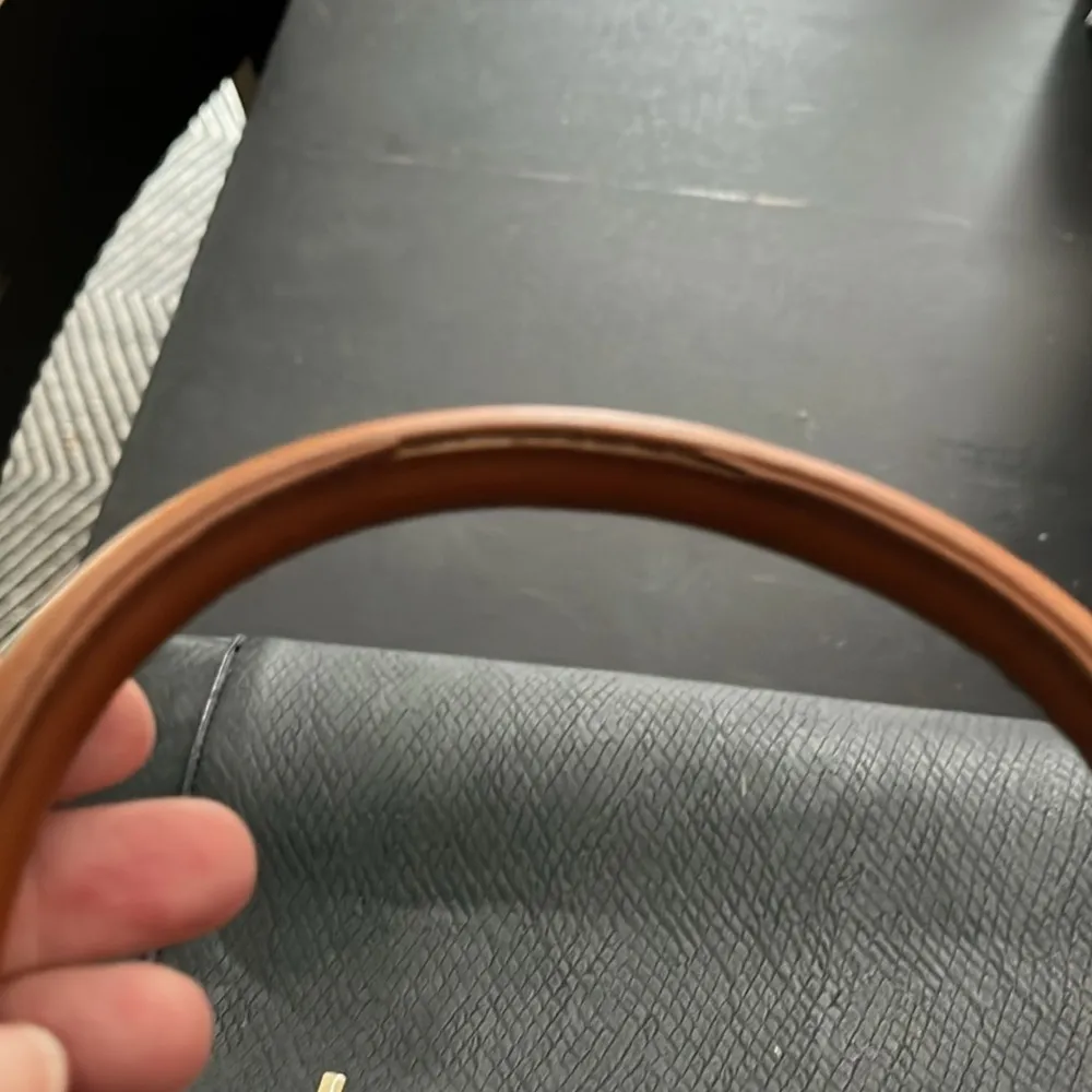 black leather purse with brown accents. Used good condition. - Image 2