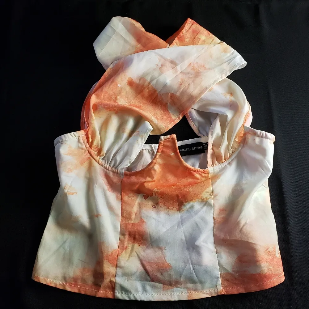 PrettyLittleThing Tie‎ Dye Abstract Underbust Halterneck Cross Over Zip Crop Top - Image 2