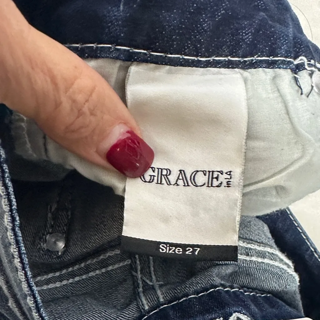 Grace Dark Blue Flare Jeans with Patterned Hem and Leg Size 27 - Image 11